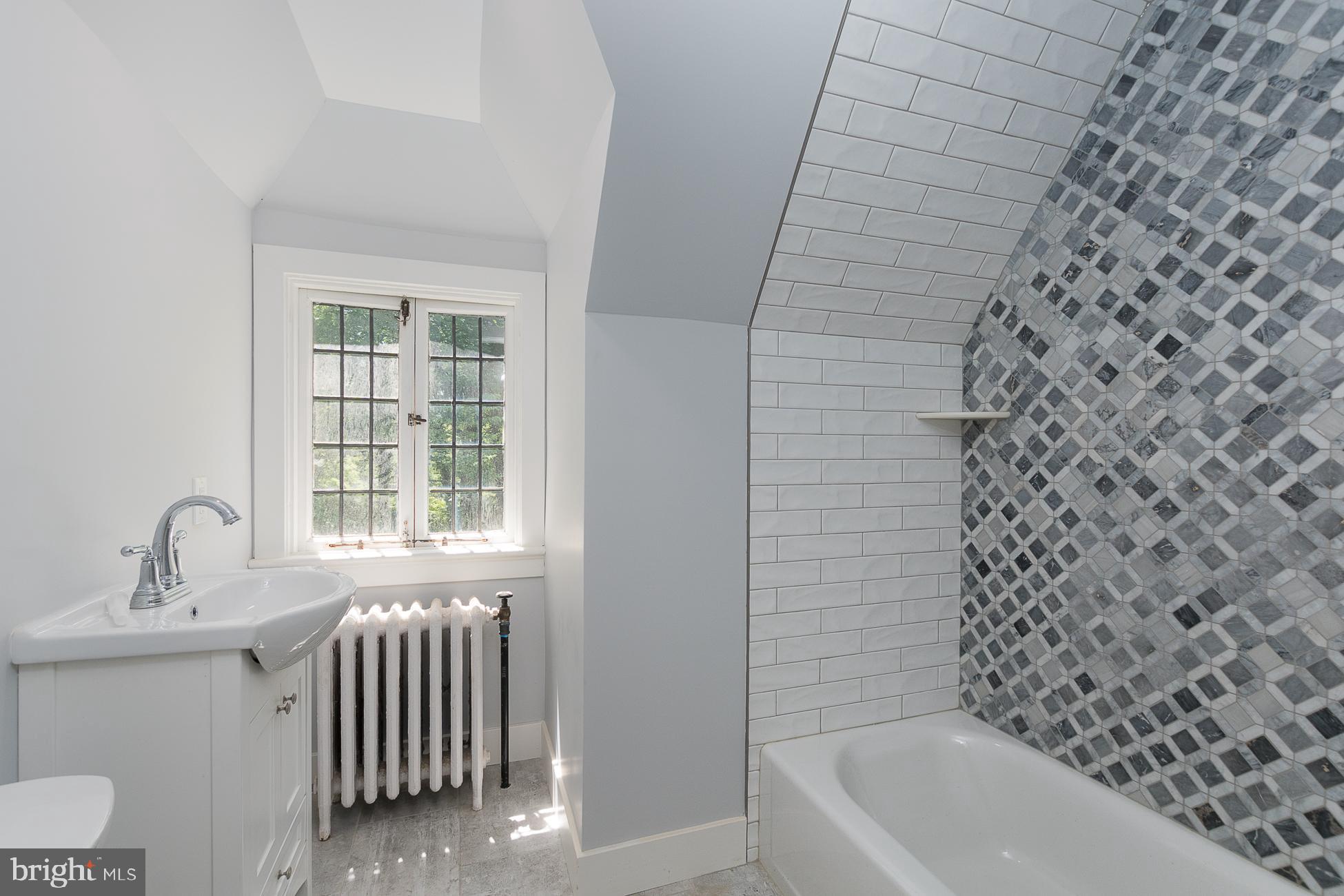 94 Rosedale Road Princeton, NJ 08540 - Photo 38 of 63 Remodeled bath with barn doors.