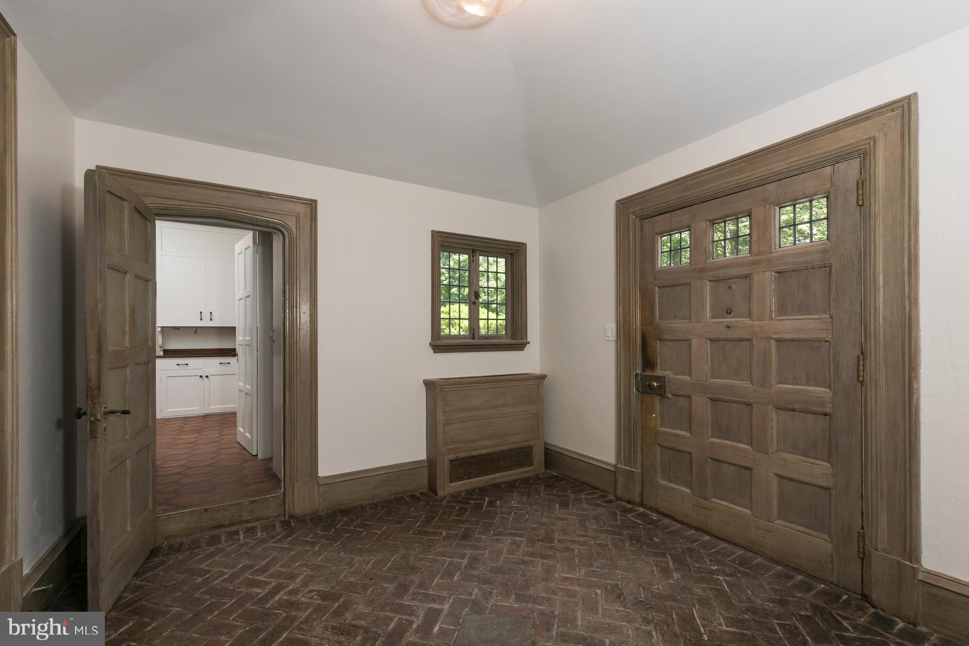 94 Rosedale Road Princeton, NJ 08540 - Photo 5 of 63 Vestibule - herringbone pattern brick floor