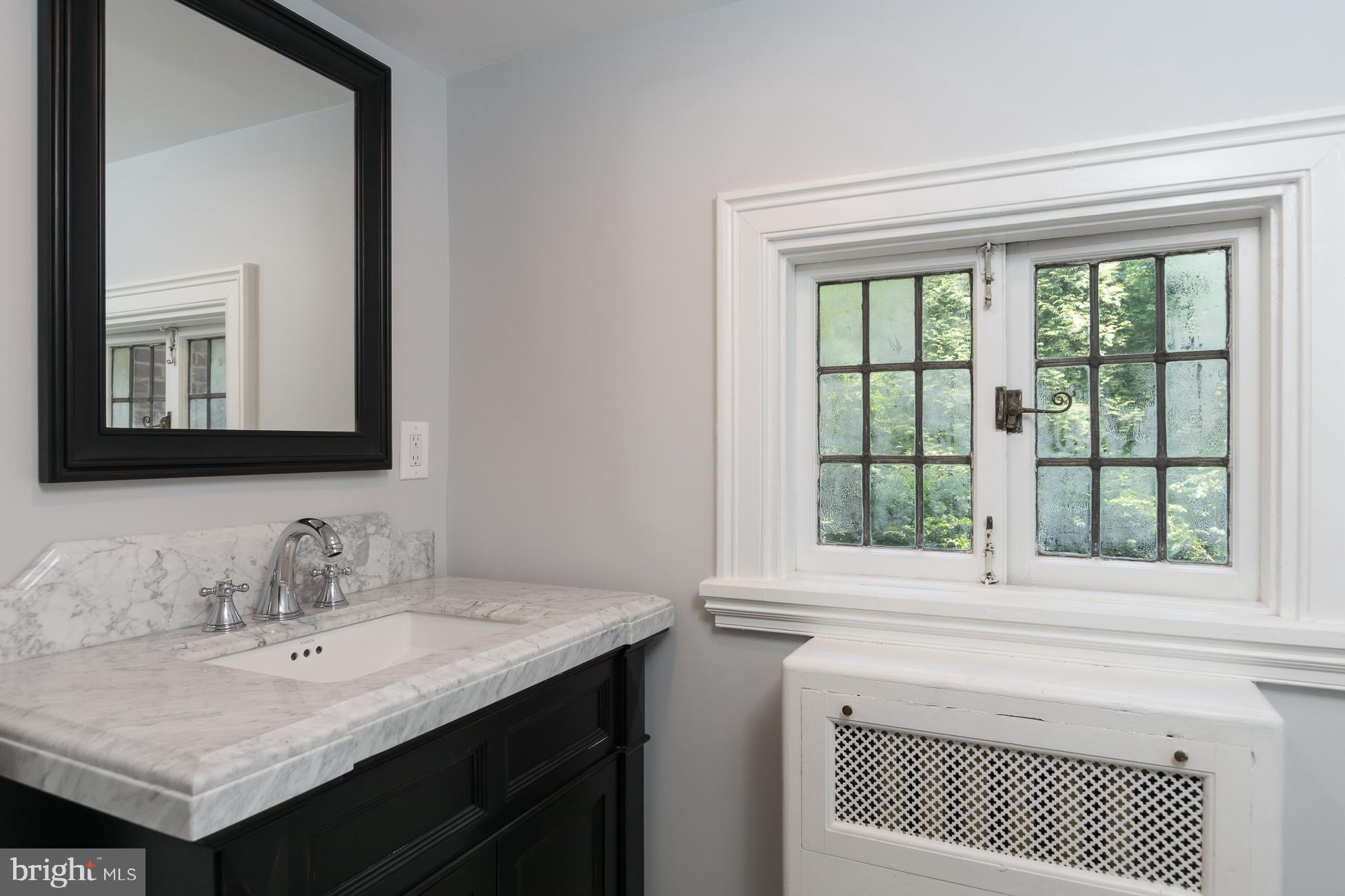 94 Rosedale Road Princeton, NJ 08540 - Photo 7 of 63 Powder room off of vestibule and coatroom