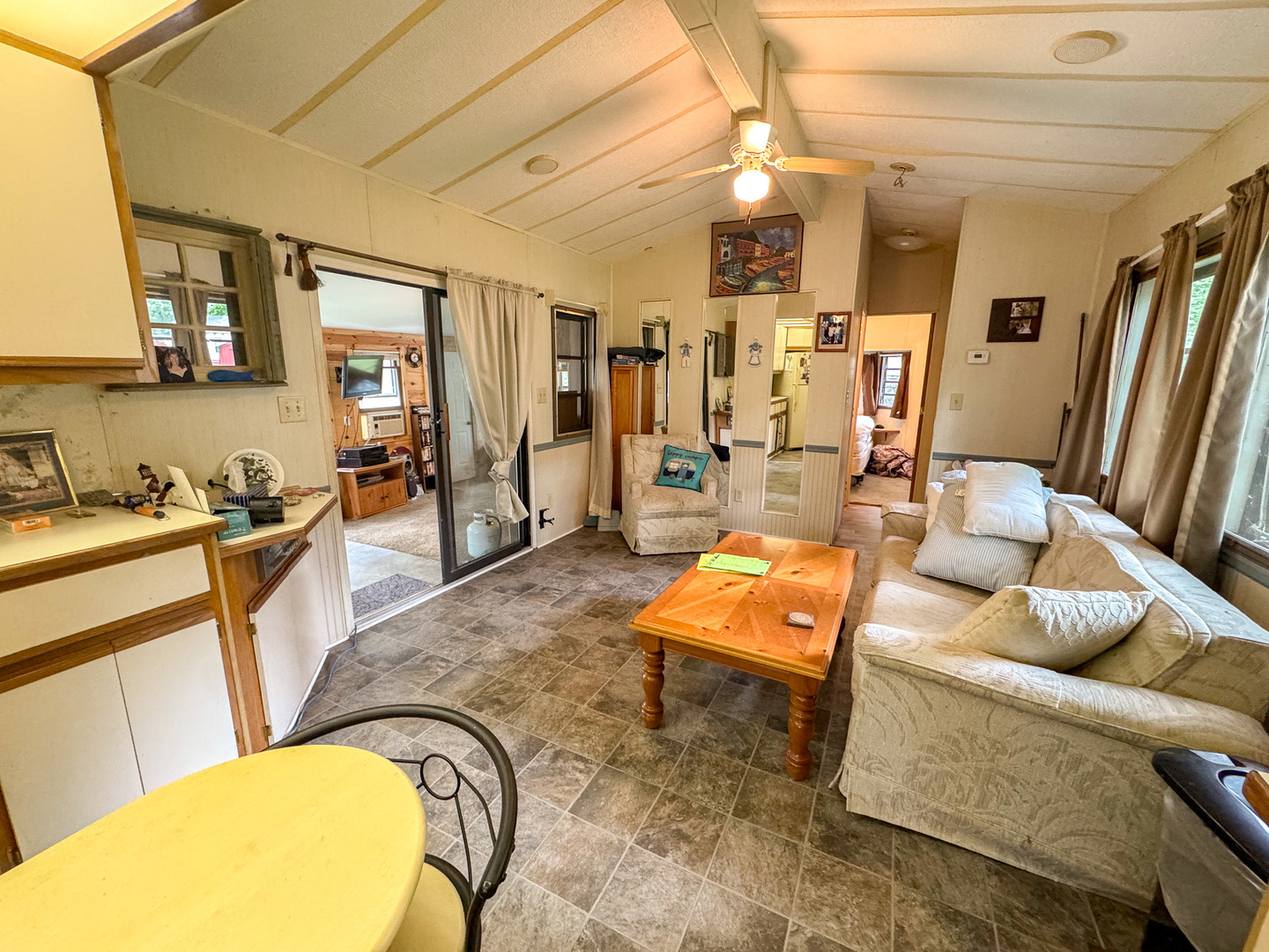 2-24 Woodhaven Sublette, IL 61367 - Photo 11 of 17 a living room with furniture and a flat screen tv