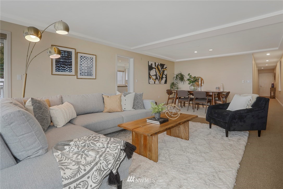 601 West Mercer Place, Unit 201 Seattle, WA 98119 - Photo 7 of 36 a living room with furniture and wooden floor