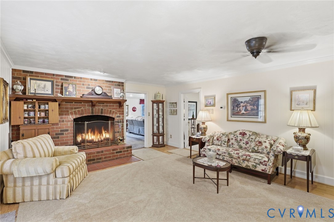 11016 Pridesville Road Amelia Court House, VA 23002 - Photo 14 of 54 Brick fireplace with an arched opening, wood mante