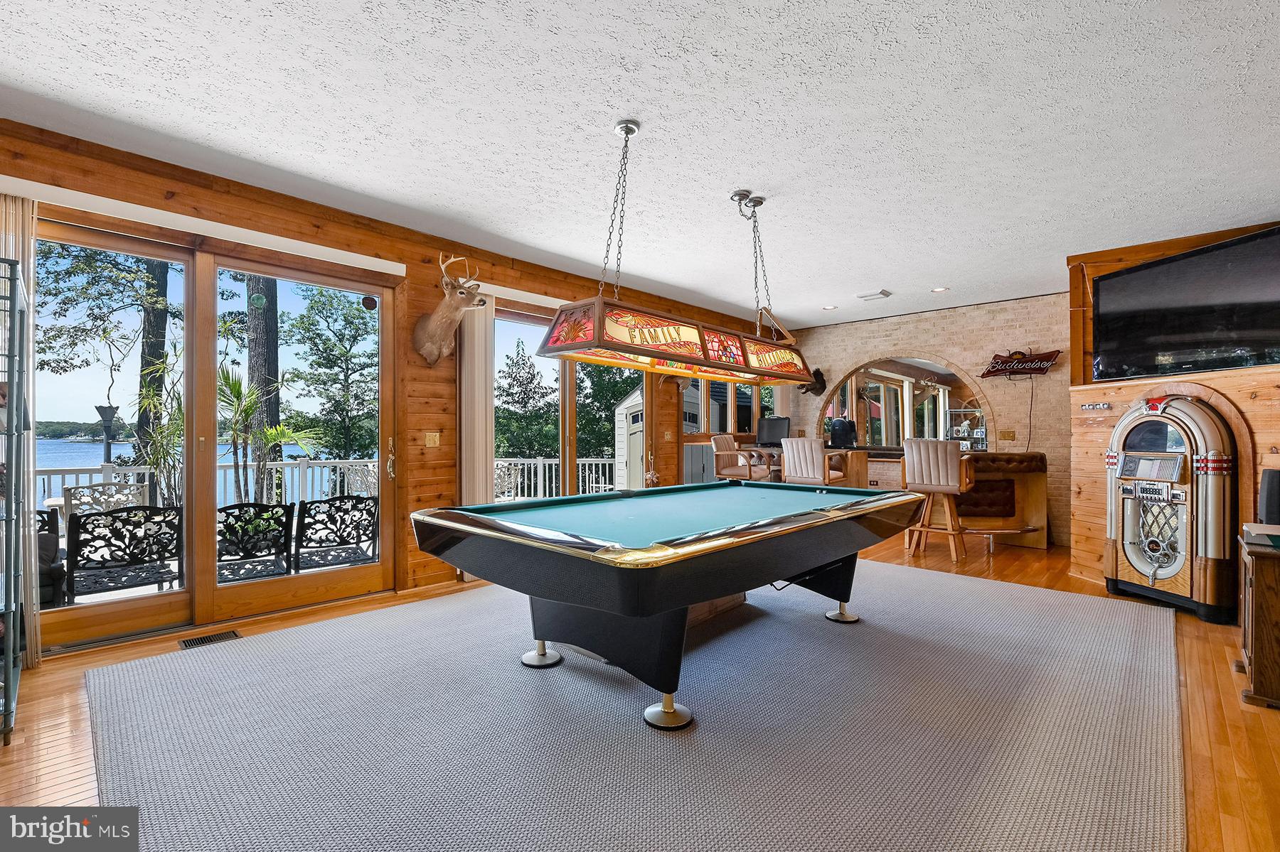 342 Hunner Road Pasadena, MD 21122 - Photo 30 of 67 Game room opens to the waterside deck