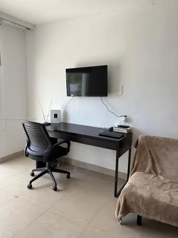 a living room with a couch and a coffee table