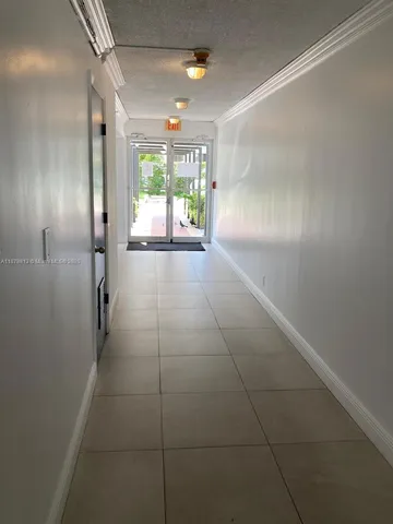 a view of hallway with an empty space