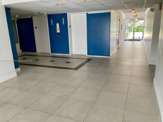 a view of gallery with windows