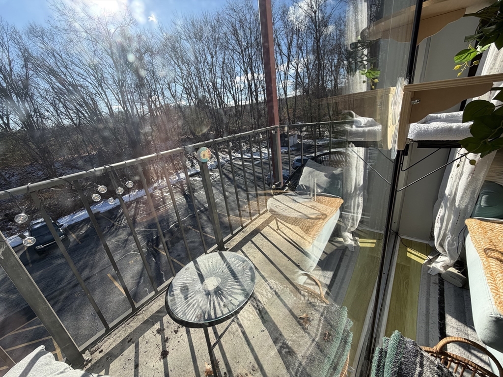 136 Central Street, Unit C 6 Hudson, MA 01749 - Photo 13 of 20 a view of balcony and deck