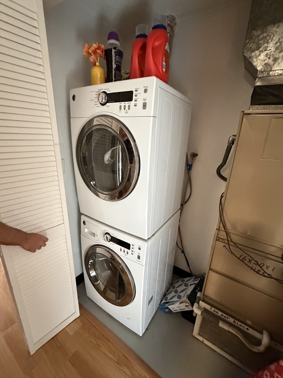136 Central Street, Unit C 6 Hudson, MA 01749 - Photo 15 of 20 a utility room with dryer and washer