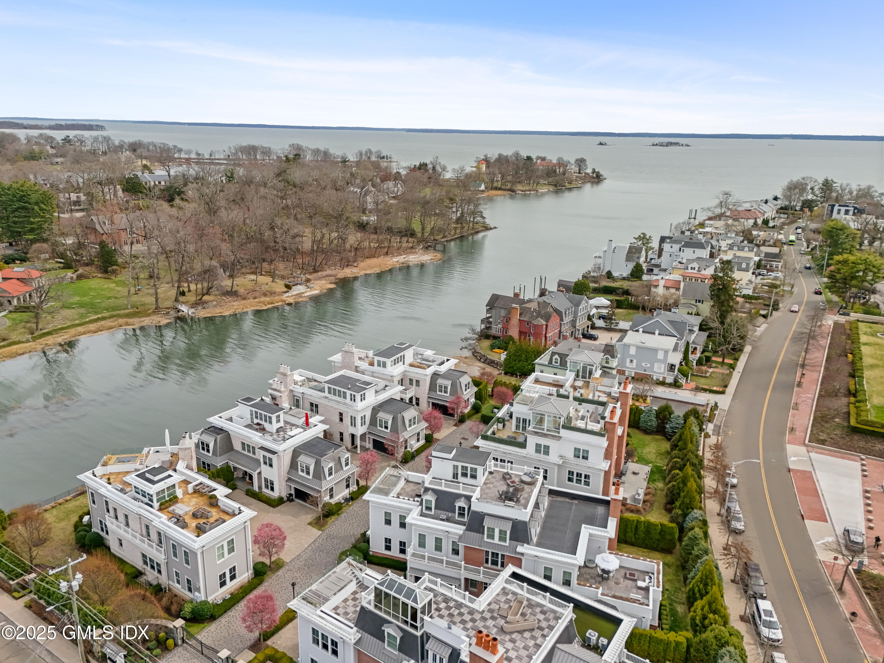 2 Oneida Drive, Unit B2 Greenwich, CT 06830 - Photo 1 of 1 an aerial view of a house with a lake view