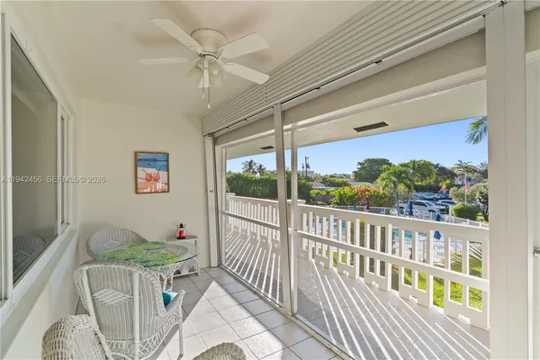 a kitchen with stainless steel appliances white cabinets and a sink