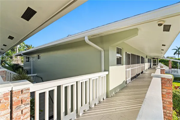 a view of a porch with furniture