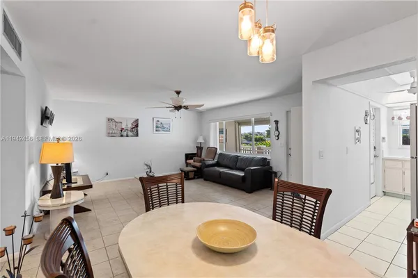 a living room with furniture and a window