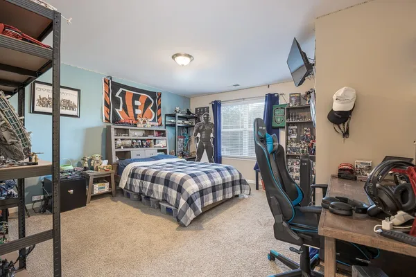 a bedroom with a bed and cabinets
