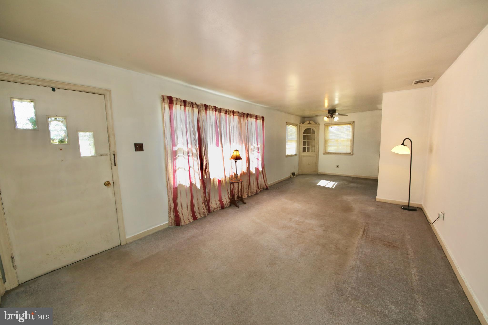 7 Warwick Road Stratford, NJ 08084 - Photo 3 of 25 en empty room with windows and entryway