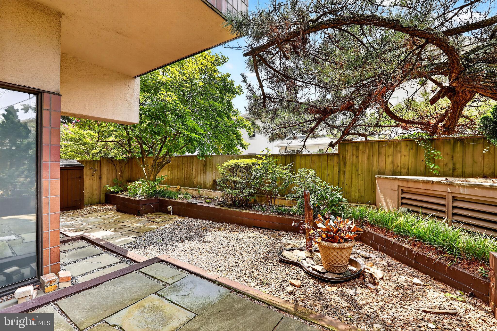 1 Markham Road, Unit 1D Princeton, NJ 08540 - Photo 33 of 55 Tranquil outdoor space with stone pathways.