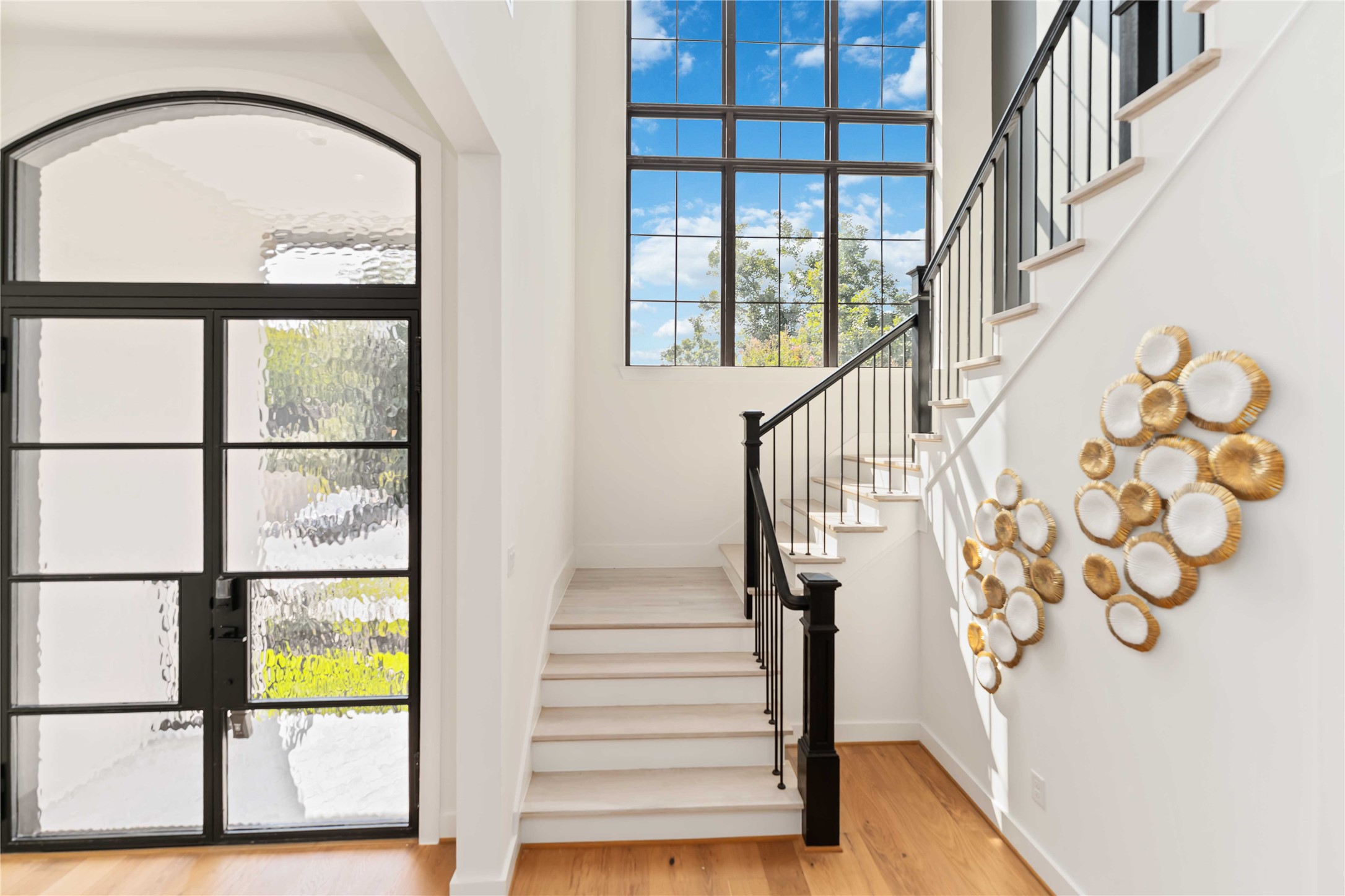 615 Wendel Street Houston, TX 77009 - Photo 11 of 21 a view of staircase with large window