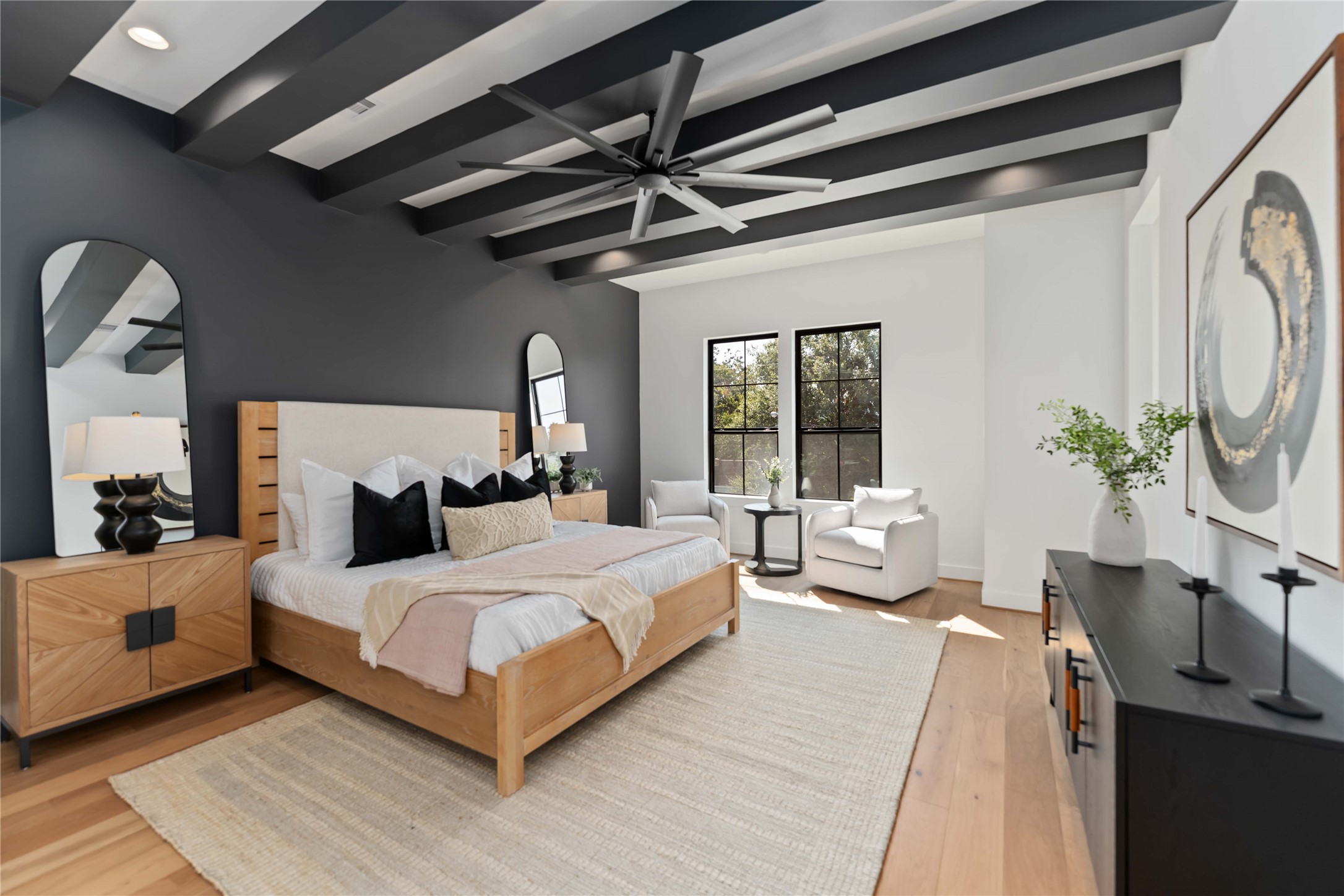 615 Wendel Street Houston, TX 77009 - Photo 13 of 21 a bedroom with a large bed and a chandelier