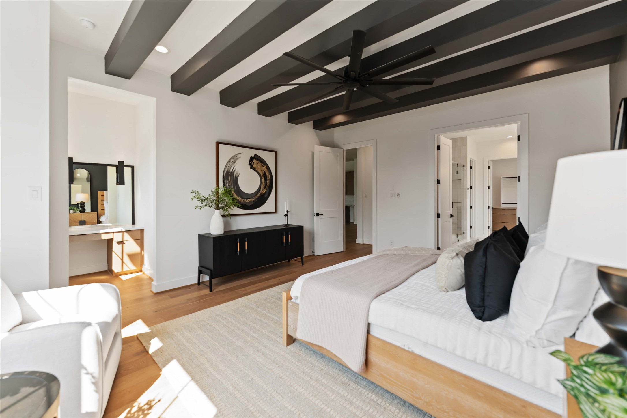 615 Wendel Street Houston, TX 77009 - Photo 14 of 21 a bedroom with a bed and a dresser