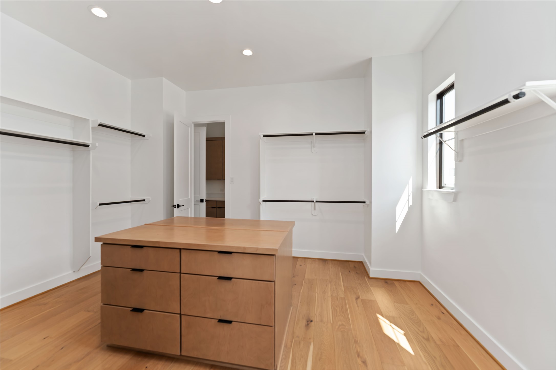 615 Wendel Street Houston, TX 77009 - Photo 16 of 21 a room with a wooden floor and white doors