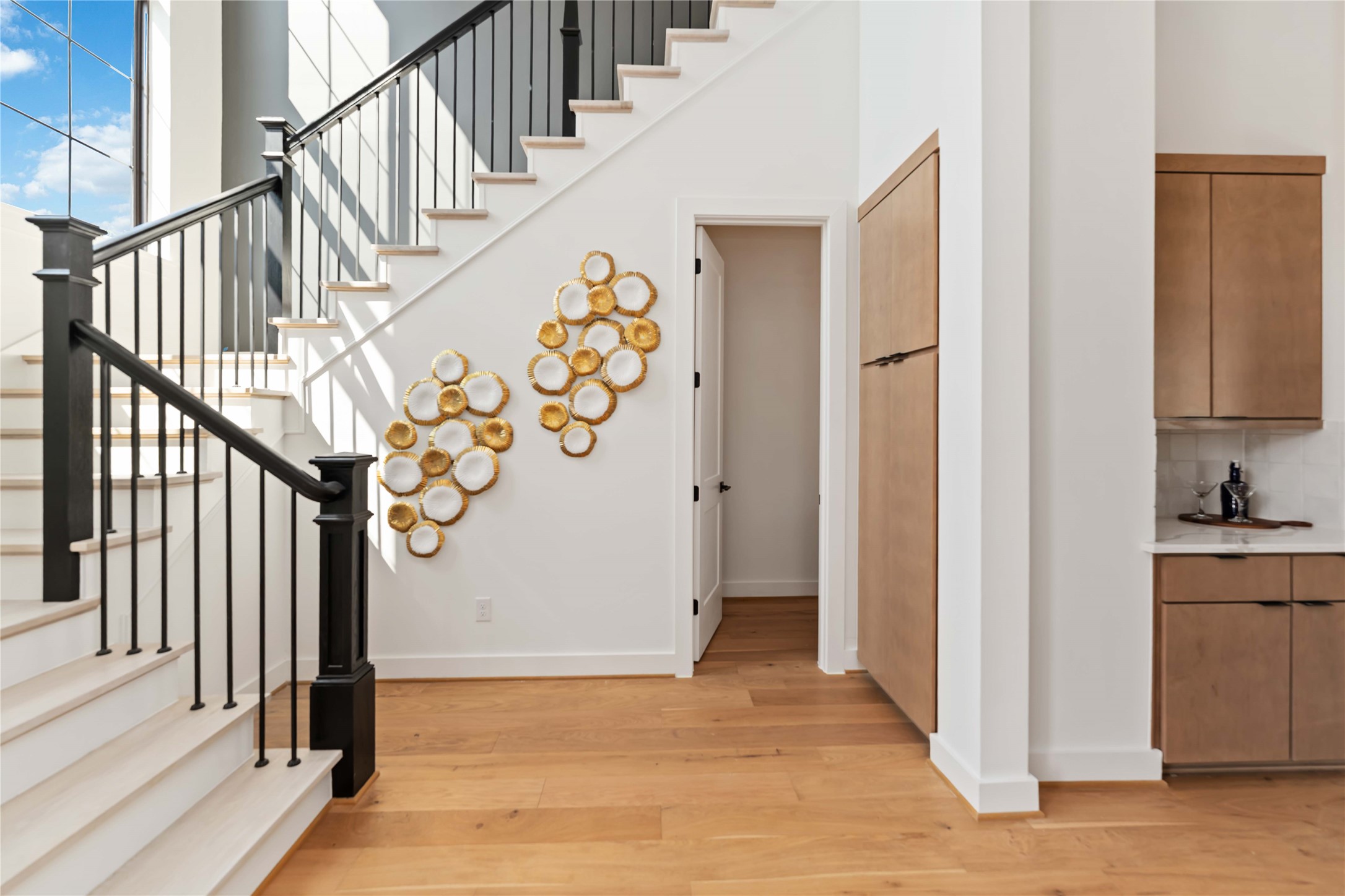 615 Wendel Street Houston, TX 77009 - Photo 9 of 21 a view of entryway with wooden floor and stairs
