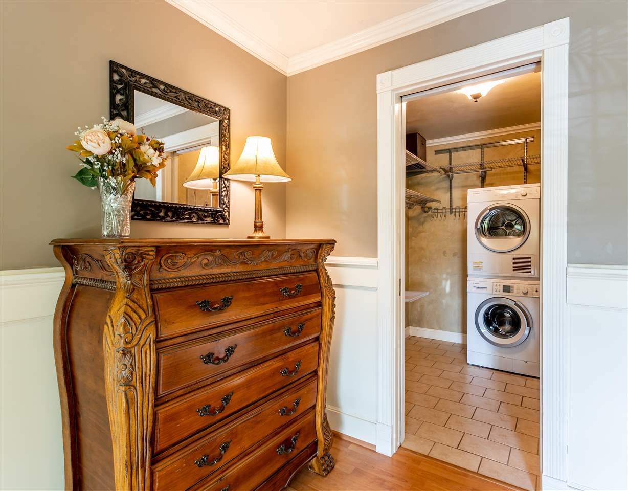140 Uwapo Road, Unit 6101 Kihei, HI 96753 - Photo 14 of 30 a view of a hallway with washer and dryer