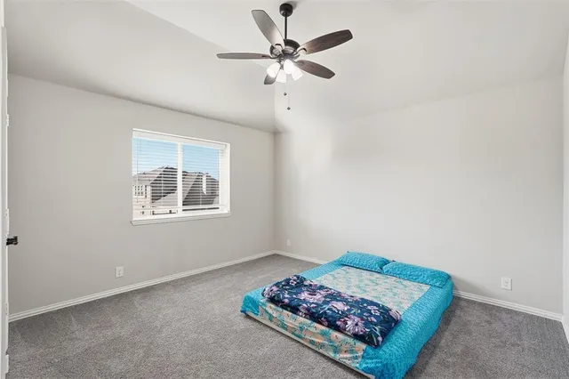 a living room with couch and a window