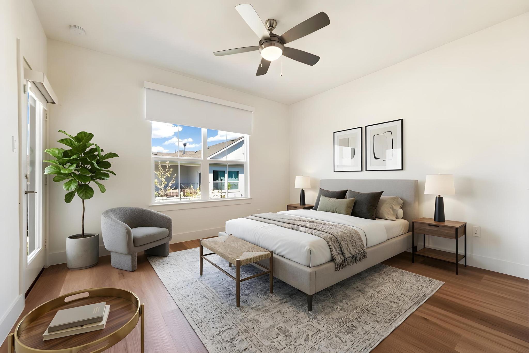 306 Cartwheel Bend, Unit 130 Austin, TX 78738 - Photo 11 of 40 a spacious bedroom with a bed and a couch