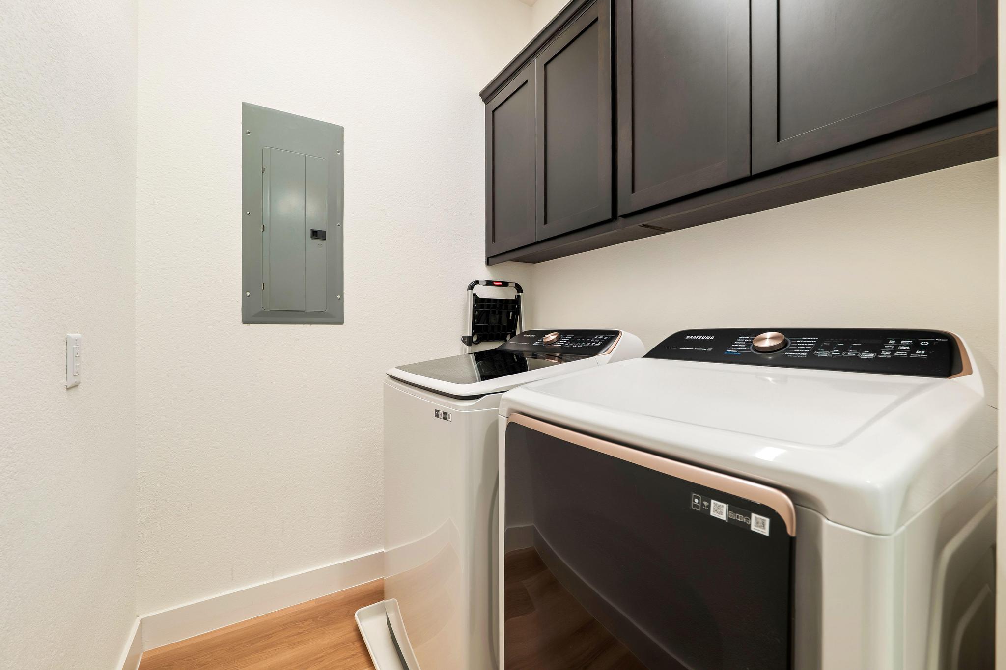 306 Cartwheel Bend, Unit 130 Austin, TX 78738 - Photo 22 of 40 a utility room with dryer and washer