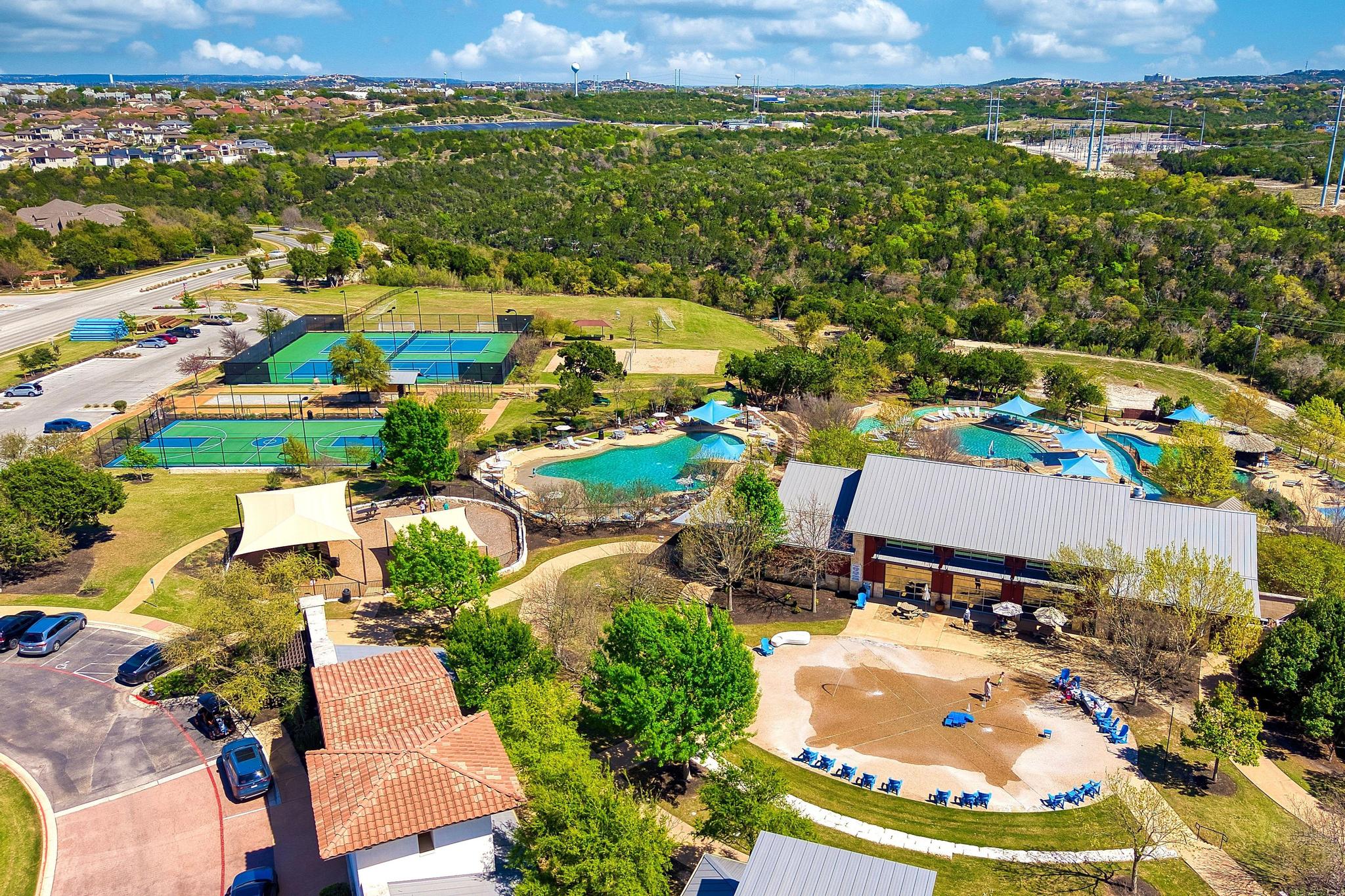 306 Cartwheel Bend, Unit 130 Austin, TX 78738 - Photo 38 of 40 an aerial view of residential houses with outdoor space