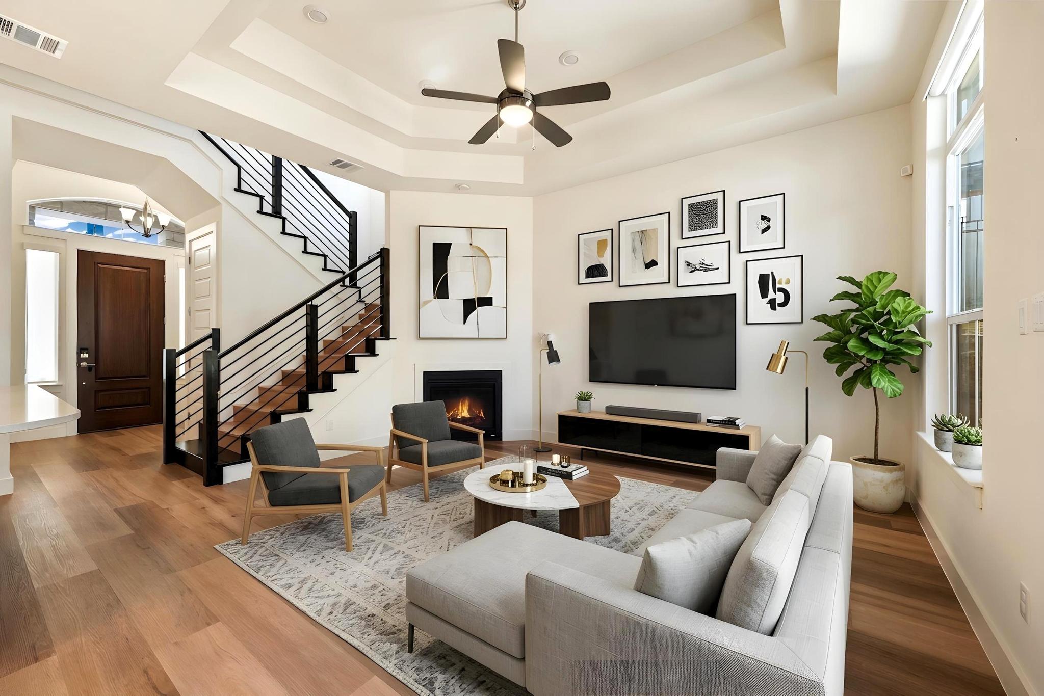 306 Cartwheel Bend, Unit 130 Austin, TX 78738 - Photo 4 of 40 a living room with furniture and a flat screen tv