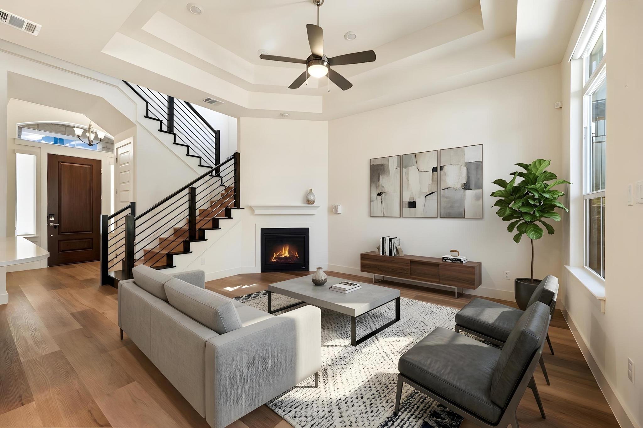 306 Cartwheel Bend, Unit 130 Austin, TX 78738 - Photo 5 of 40 a living room with furniture and a fireplace