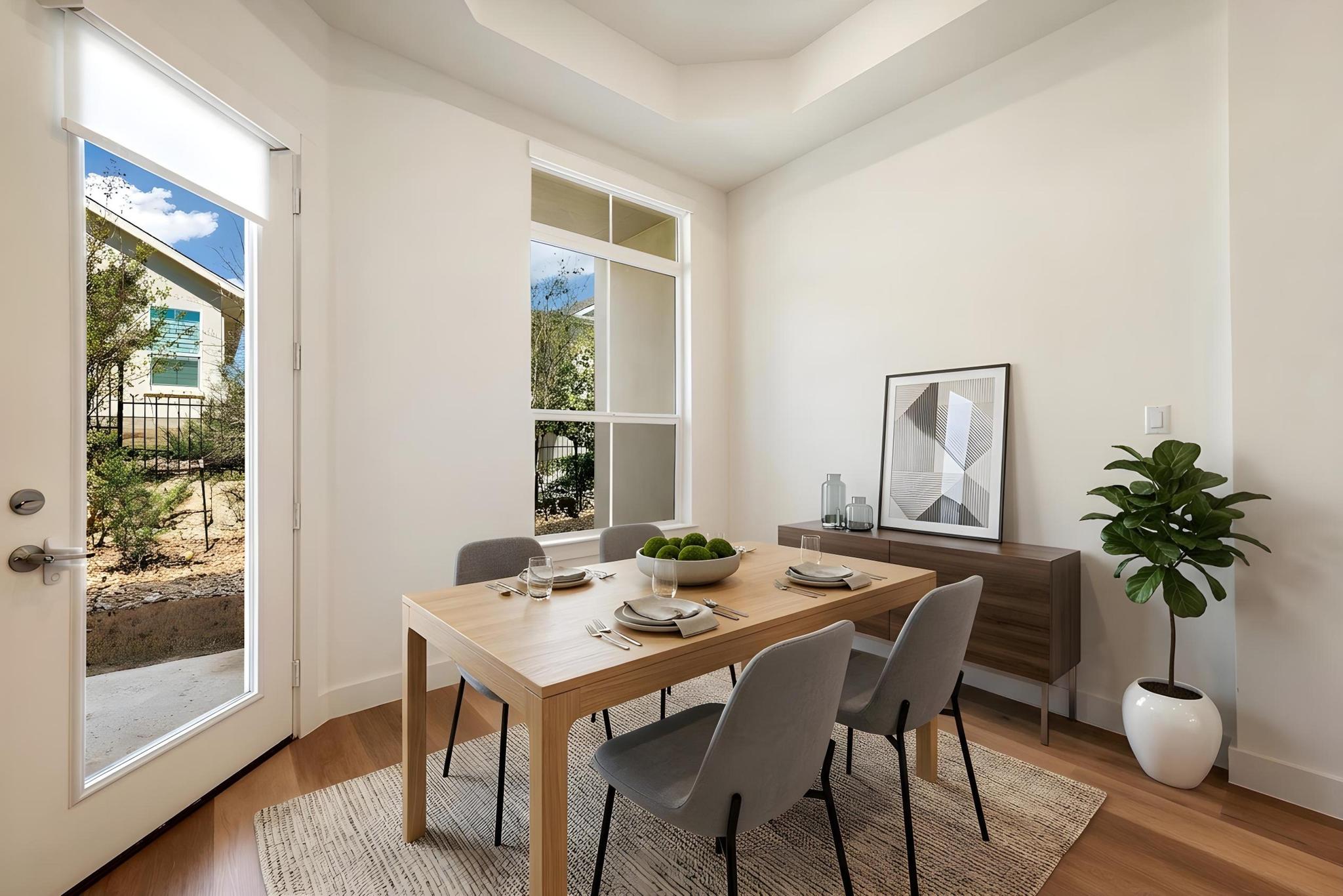 306 Cartwheel Bend, Unit 130 Austin, TX 78738 - Photo 6 of 40 a view of a dining room with furniture window and wooden floor