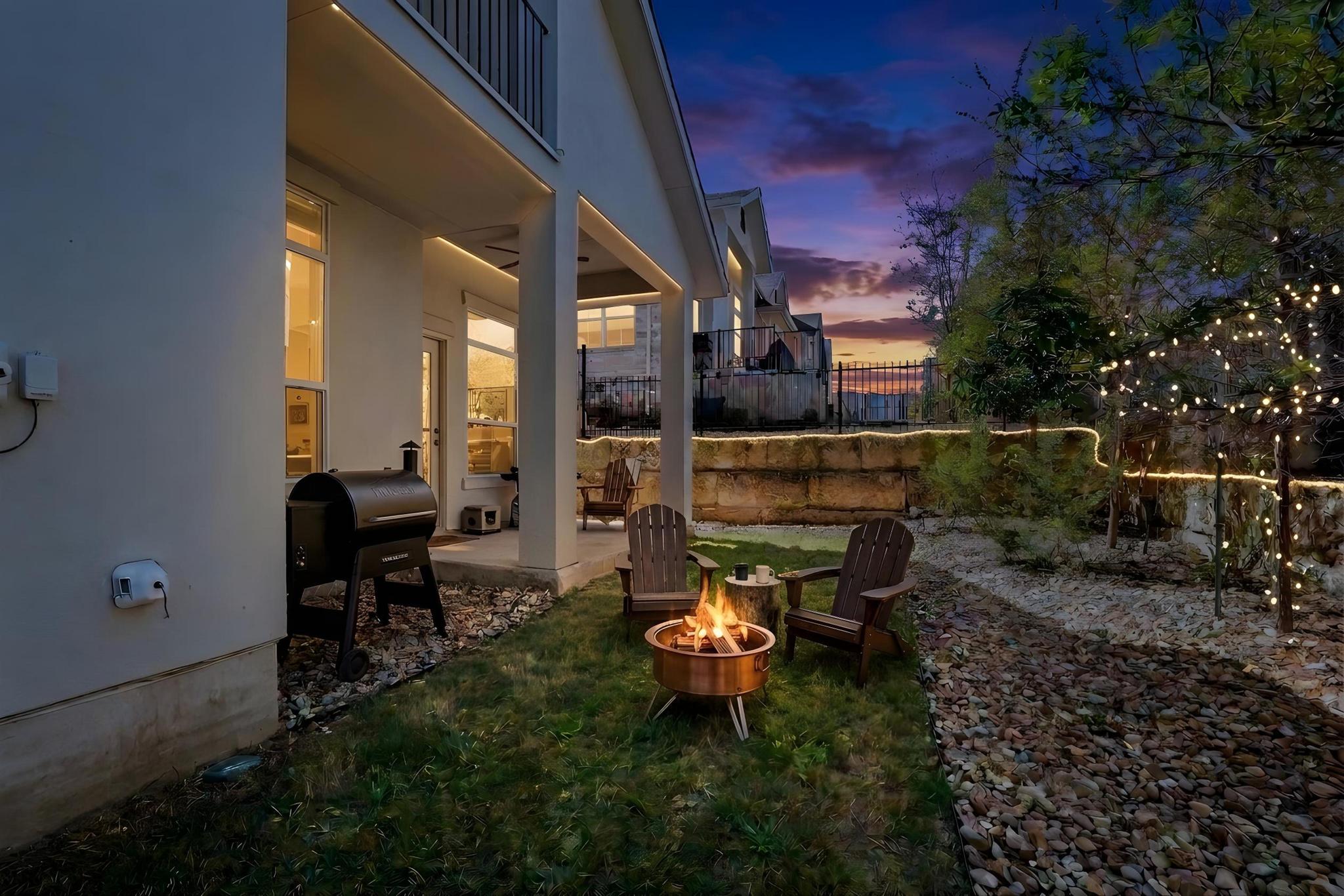 306 Cartwheel Bend, Unit 130 Austin, TX 78738 - Photo 9 of 40 a view of a patio with chairs and potted plants