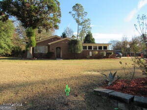 6662 Goodall Mill Road Macon, GA 31216 - Photo 1 of 50 a view of a house with a yard