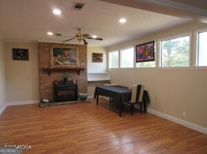 6662 Goodall Mill Road Macon, GA 31216 - Photo 11 of 50 a view of a workspace with furniture and a window