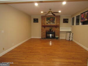 6662 Goodall Mill Road Macon, GA 31216 - Photo 12 of 50 a view of empty room with a fireplace