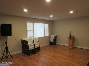 6662 Goodall Mill Road Macon, GA 31216 - Photo 13 of 50 a living room with furniture and a window