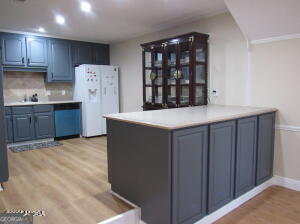 6662 Goodall Mill Road Macon, GA 31216 - Photo 18 of 50 a kitchen with a refrigerator and a stove
