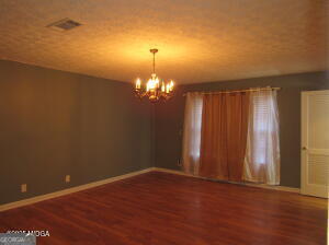 6662 Goodall Mill Road Macon, GA 31216 - Photo 25 of 50 a view of an empty room with a window