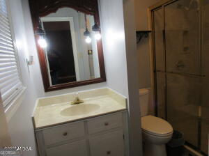6662 Goodall Mill Road Macon, GA 31216 - Photo 32 of 50 a bathroom with a sink toilet and shower