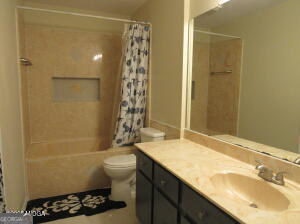 6662 Goodall Mill Road Macon, GA 31216 - Photo 34 of 50 a bathroom with a sink toilet and shower