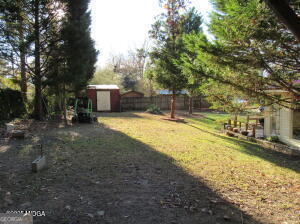 6662 Goodall Mill Road Macon, GA 31216 - Photo 44 of 50 a view of a house with swimming pool