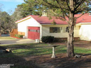 6662 Goodall Mill Road Macon, GA 31216 - Photo 46 of 50 a front view of a house with garden