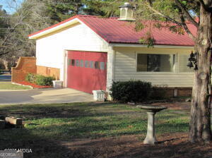 6662 Goodall Mill Road Macon, GA 31216 - Photo 47 of 50 a view of a house with backyard and sitting area