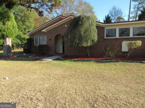 6662 Goodall Mill Road Macon, GA 31216 - Photo 5 of 50 a view of a house with a yard