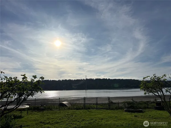 a view of a lake and mountain in the back