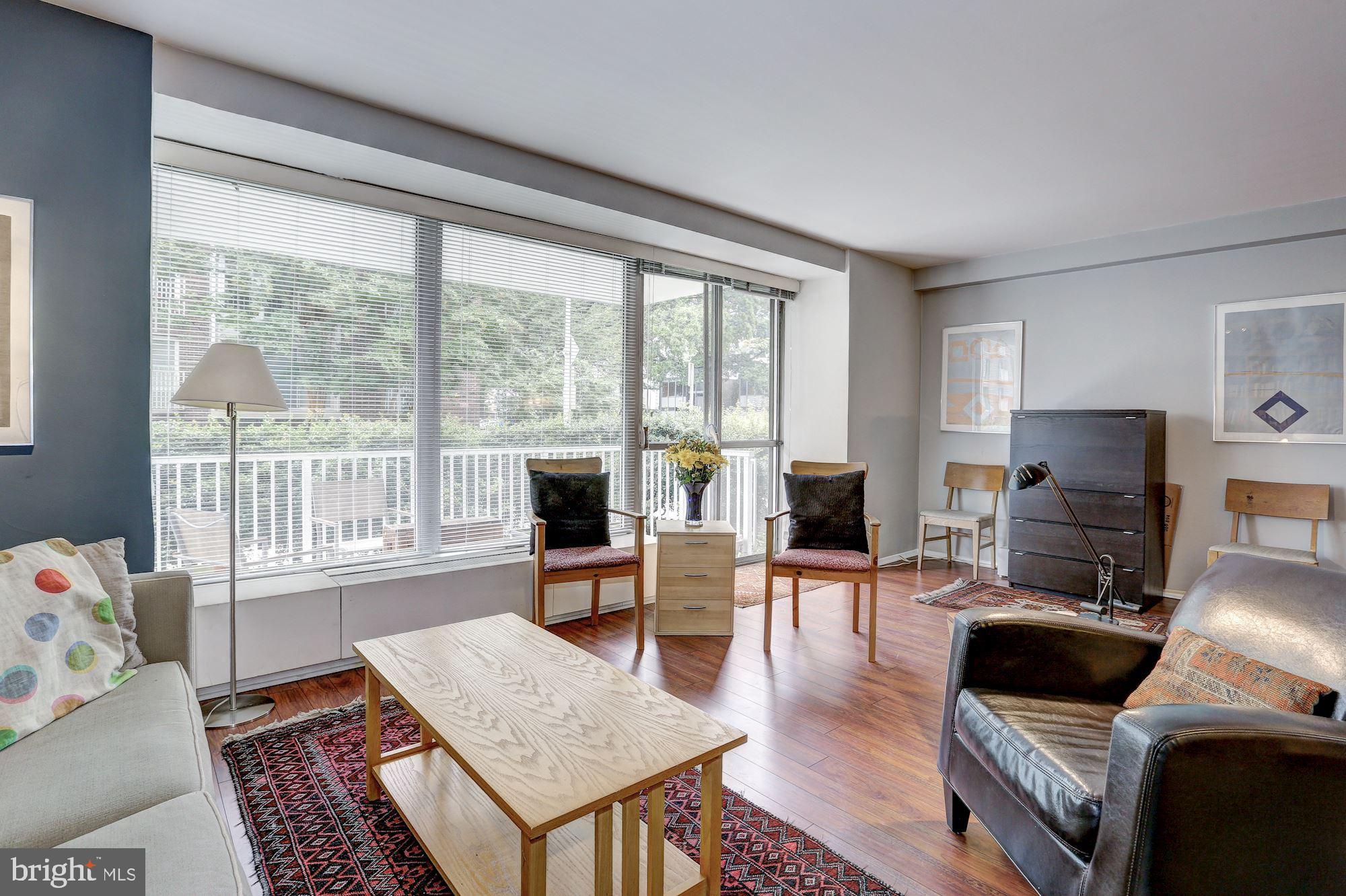 400 O Street Southwest, Unit 102 Washington, DC 20024 - Photo 13 of 30 Living Room/Dining Room Area Overlooking Patio