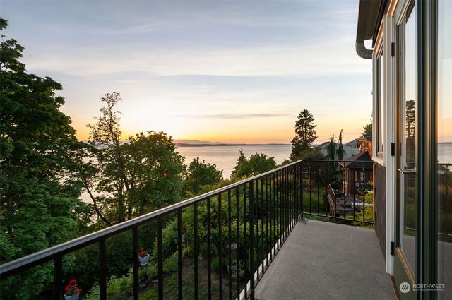 a view of a balcony with city view