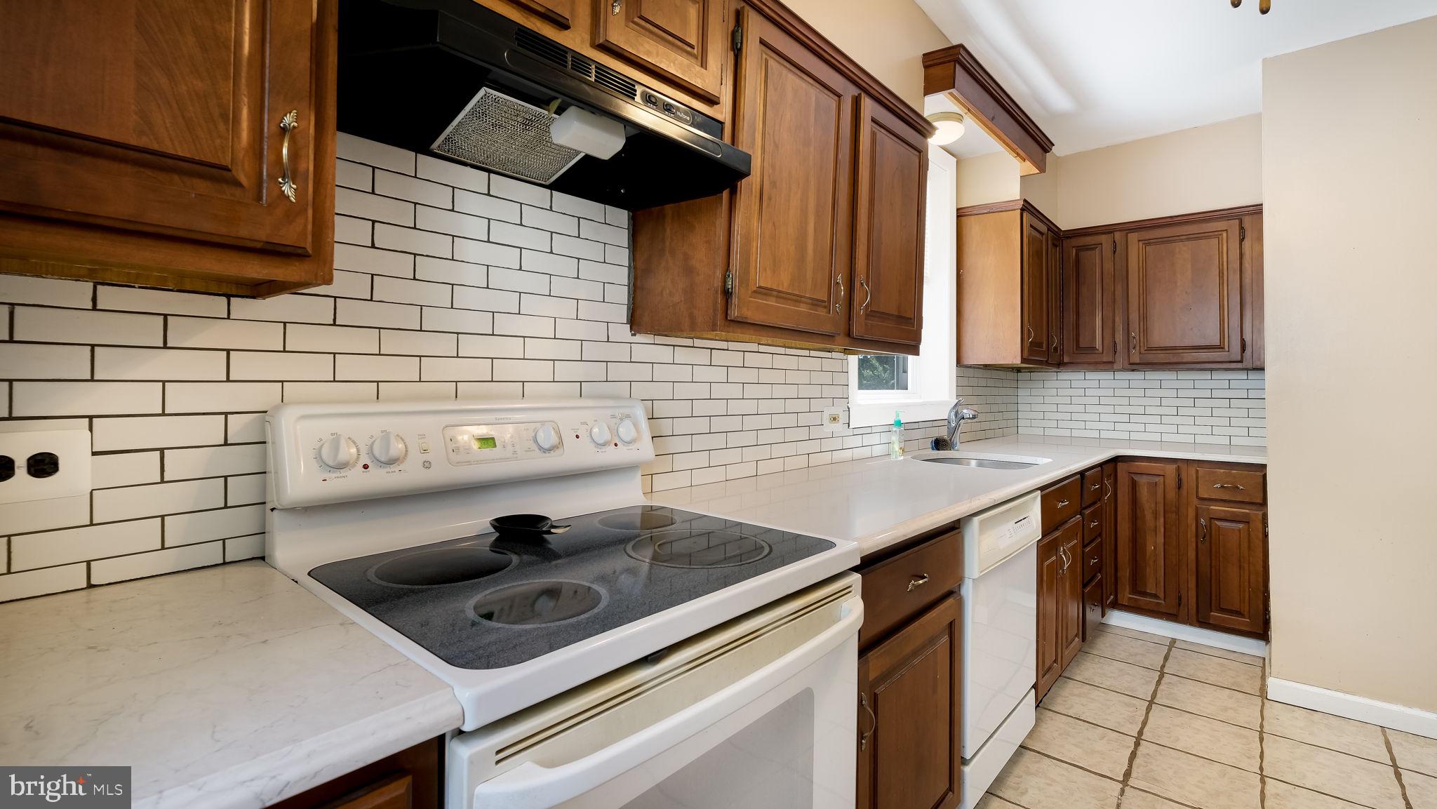 271 Ballymore Road Springfield, PA 19064 - Photo 13 of 21 a kitchen with a sink and cabinets