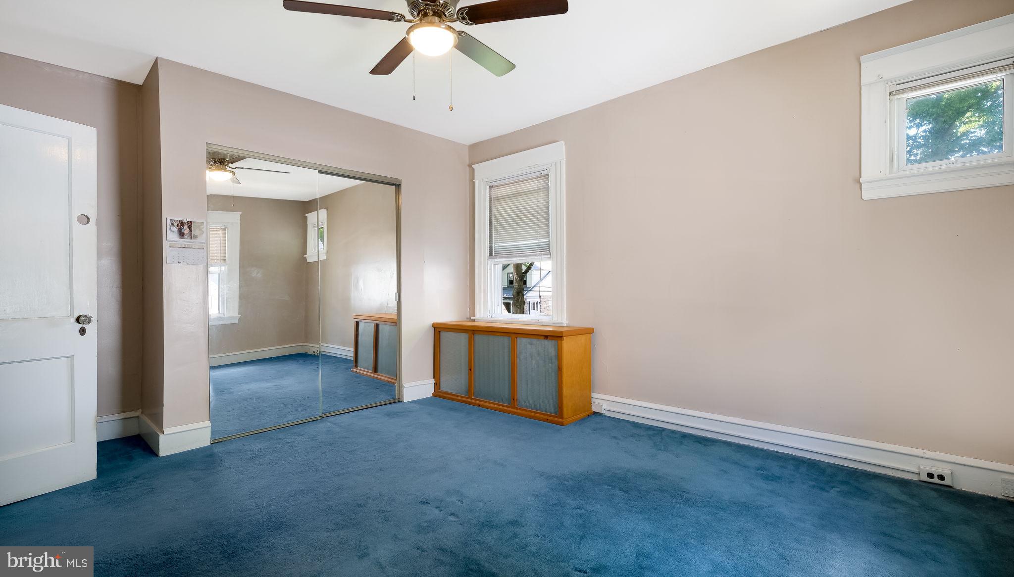 271 Ballymore Road Springfield, PA 19064 - Photo 19 of 21 an empty room with fan and windows